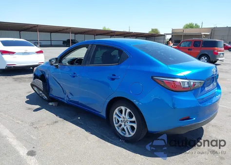 2018 Toyota Yaris Ia из США, поврежденный, VIN 3MYDLBYV7JY314998